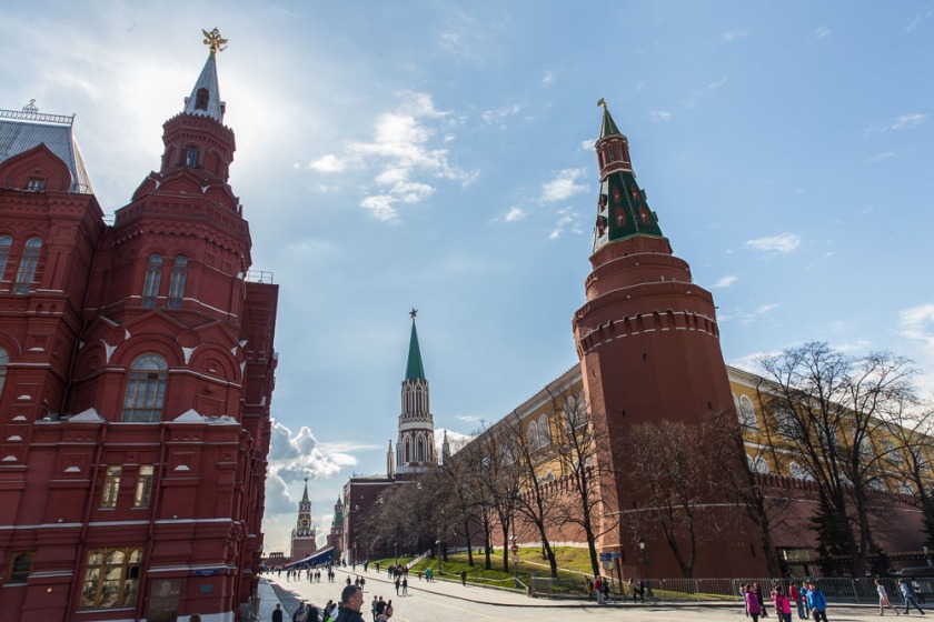 Looking up the road to Red Square with the Kremlin Walls and towers on the right.